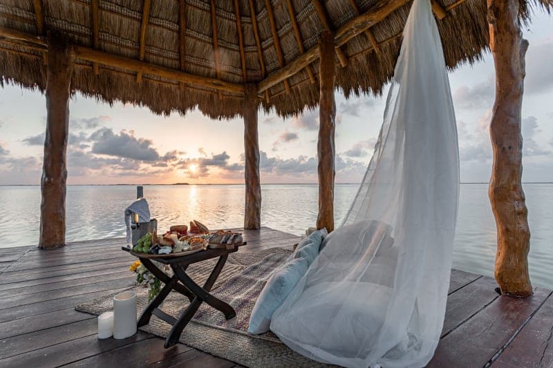 Private lagoon dock at sunset — ANANA Casa Cantarena